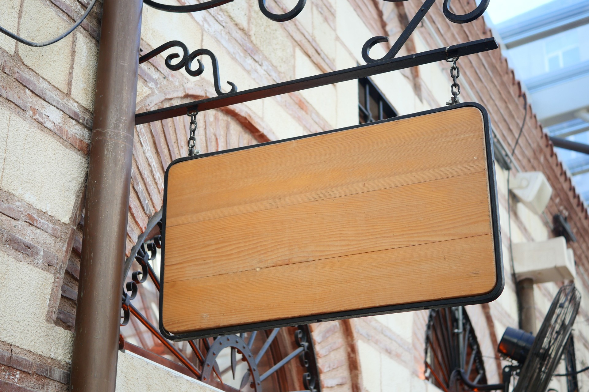 Street signboard mockup on modern city building
